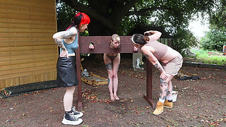 Naked Humiliation Girl Is Put in Stocks & Degraded