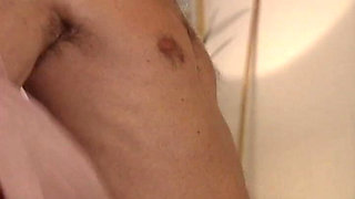 Sharp Brunette with Pinned up Hair with Two Men