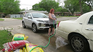 Sexy Mature bbw redhead  Nurse Vicki washes her car!