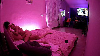 Kamila and Danildo cuddling in bed