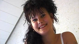Horny girl lays in bed finger fucking herself and stroking clit