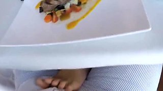 Bold Amateur Chick Gives Footjob Under Restaurant Table