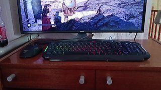 Korean woman sucks a nerd's cock while he's playing on the computer