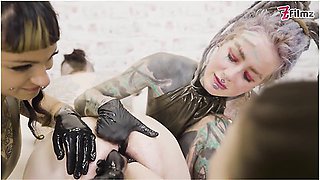Lily Lu and Miss Flora double-fist extreme anal with cock cage