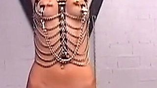Insatiable MILF Submits to Chain Bondage Whipping