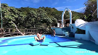 Tattooed Latina getting freaky by the pool