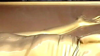 Latex Lovers Encased in Gold