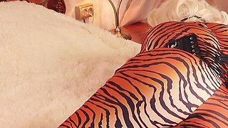 Submissive MILF gagged and bondage taped in spandex catsuit