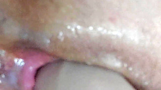 Playing with an Oiled Pussy Close-up