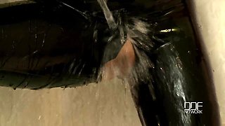 Bartroom dildoing in latex