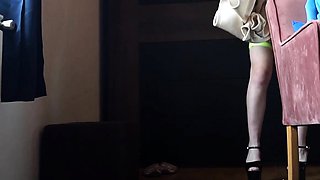 Redhead co-ed slowly strips to lingerie while cleaning her r