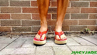 Small Asian Feet in Red Heeled Flip Flops
