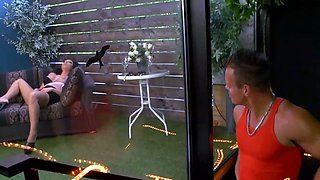 A super sexy brunette massages her big boobs