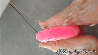 Dildo footjob in the shower with soap