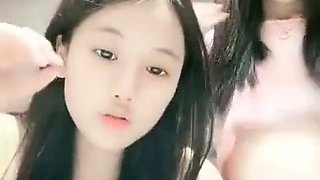 Cute Asian amateurs love having kinky lesbian sex