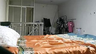 Cute amateur asian web cam girl playing with her toy