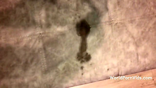 A Young Babe Leaves a Wet Spot on Her Couch When Masturbating