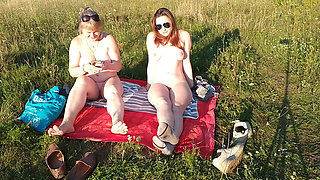 Beauties Sunbathing on the Beach