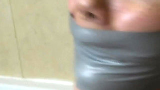 Lilly in: She Got Taped up, Tape Wrap Gagged and Questioned!