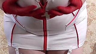 A Mature Wife Is Getting Ready for a Christmas Party and Trying on a Nurse's Uniform. Does She Want to Get Fucked There? PAWG.