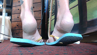 Blue rubber flipflop shoeplay