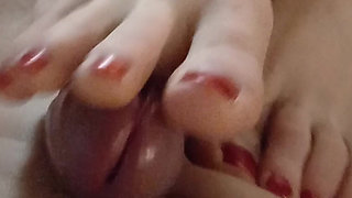 Kelly Performs a Technical Footjob Bringing Dominik's Cock to a Squirting Orgasm.