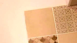 Hot housewife sexually rustles her apron in the kitchen