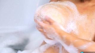 Remarkable japanese hottie smashing clit at the bathtub