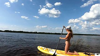 Big-Ass Blonde's Naked Walk on a Paddleboard