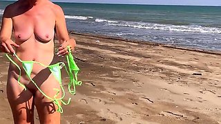 Hot MILF dominates cuckold husband on nude beach - pussy eating & rimming humiliation