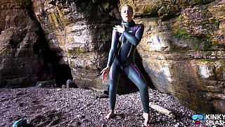 Shiny Rubber Wetsuit Tease in Private Cave