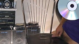 A mature woman in black leggings performs an intense ha