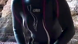 Shiny Rubber Wetsuit Tease in Private Cave