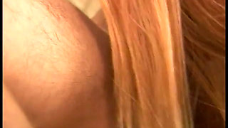 A mature blonde bombshell licks a cock and sucks cum in her mouth