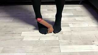 Sexy Dominatrix in Nylon Pantyhose Is Trampling Your Cock