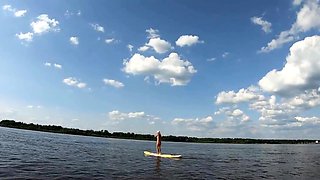 Big-Ass Blonde's Naked Walk on a Paddleboard