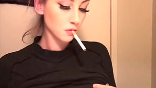 Artemisia Love smoking a cigarette and showing her perfect tits