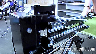 Mechatronics Technician Tests a Machine