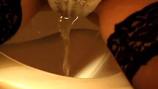 Toilet Pissing Through Lace