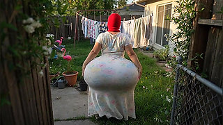Big Ass Neighbor in Schoolgirl Uniform in the Backyard