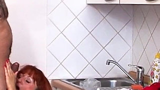Ginger MILF with hairy pussy lets husband fuck her in the kitchen