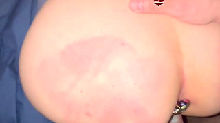 Doggystyle and spanking with a girl plugged
