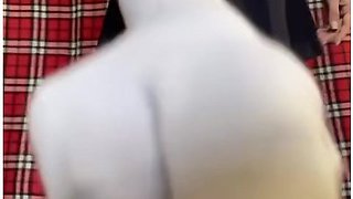 Schoolgirl flashes white panties under her skirt