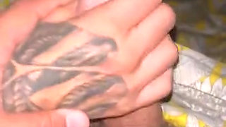 Tattooed amateur MILF handjob