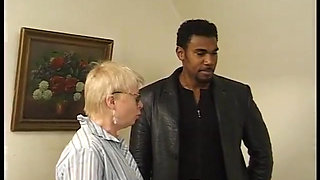 Horny granny blows and slams black guy's cock