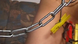 Brunette MILF Endures Heavy Clamps and Chains