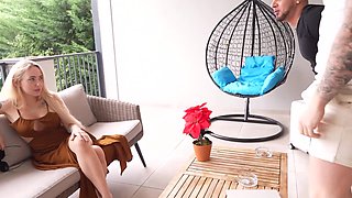 Busty blonde takes their both cocks in her on the porch