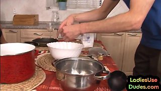 Guy get straponned in the kitchen