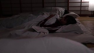 Asian bitch stuffs hairy slit with toy