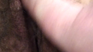 Masturbating